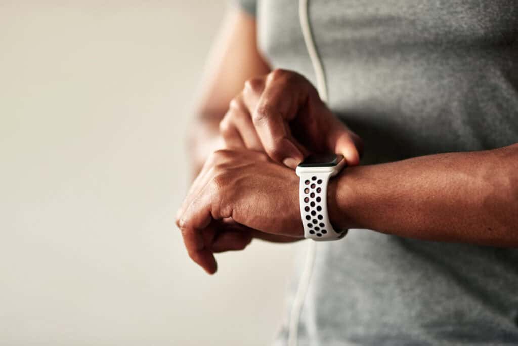 Man's arm with mobile technology wearable