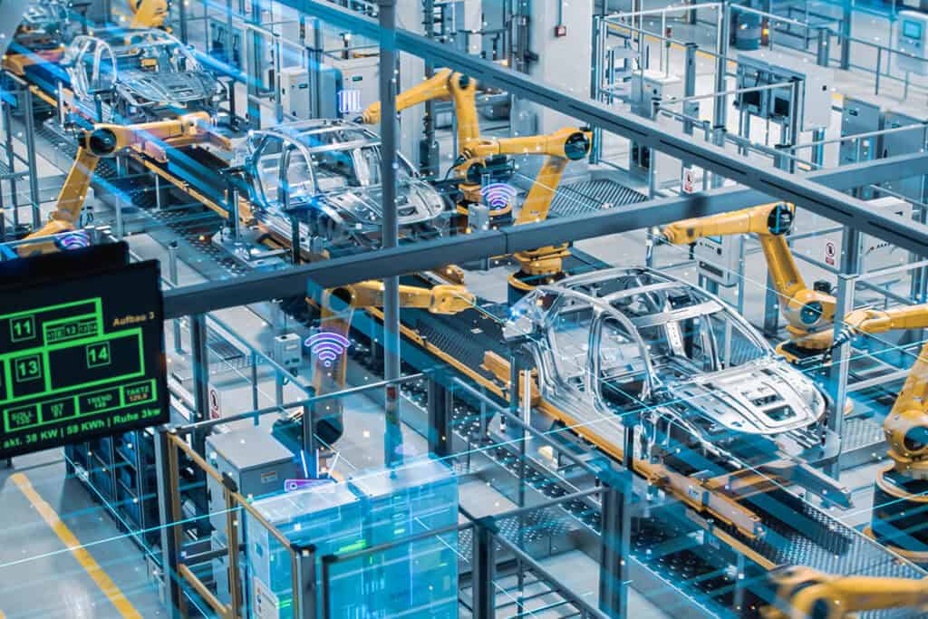 Automated car assembly line, representing ERP Artificial Intelligence in manufacturing.